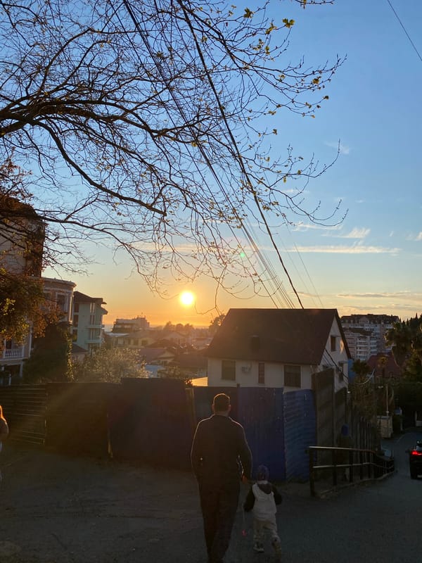 Sunset captured across Sochi streets and buildings