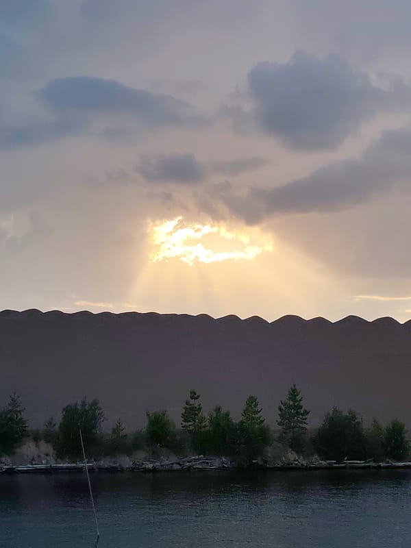 Quarry, barge, and dusk light at Kvartsitny, Russia