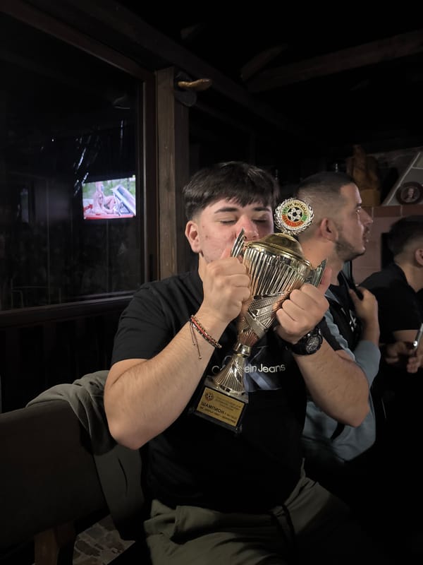 Young men celebrate soccer trophy victory in Zlatograd gathering