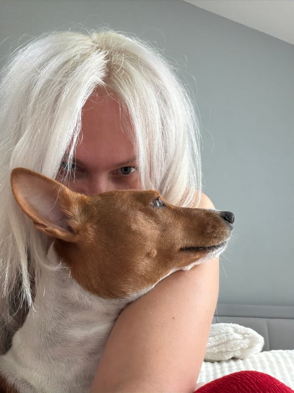 Woman takes bedroom selfies with pet dog in Salford