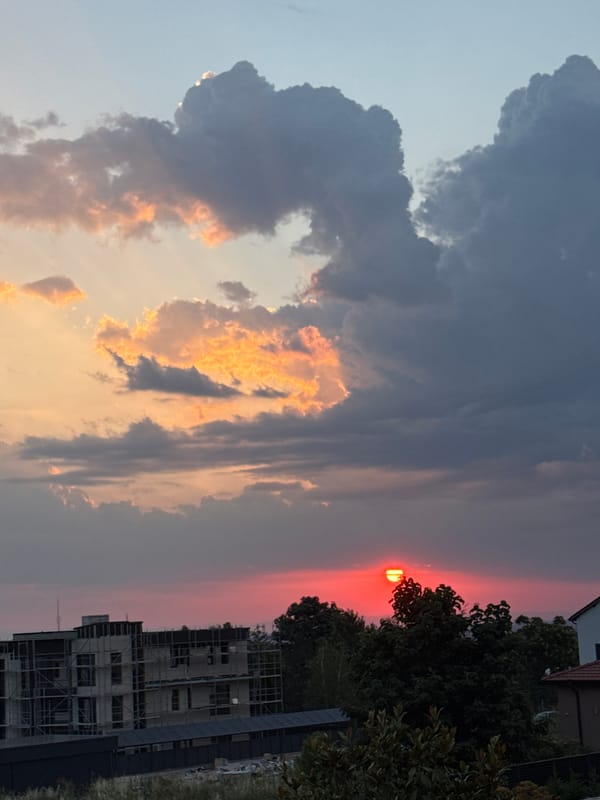 Vivid urban sunset with fiery skies and dramatic clouds
