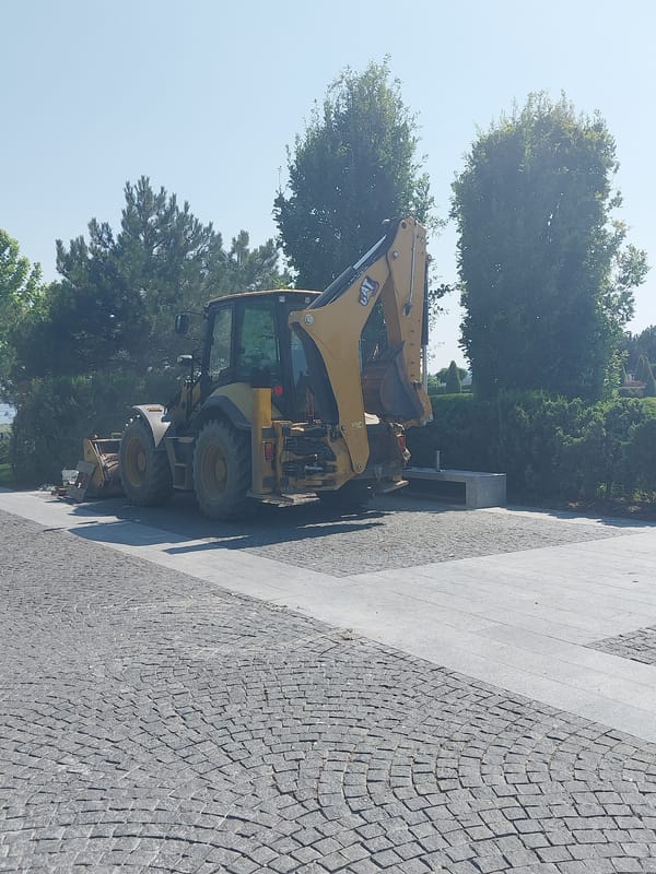 Peacocks, lily ponds, and a backhoe in a Ukrainian park