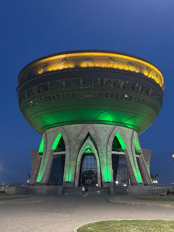 Evening family visit to Kazan landmarks captured at dusk
