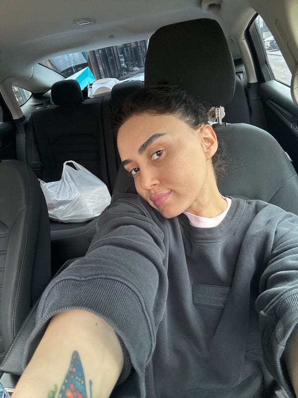 Person takes selfies in car in Tbilisi