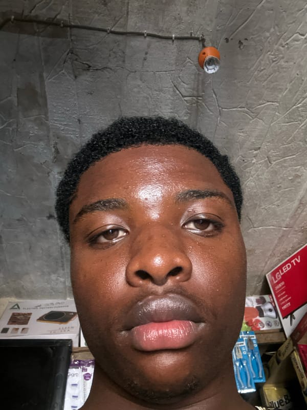 Young men photographed in casual moments across Bukuru, Nigeria