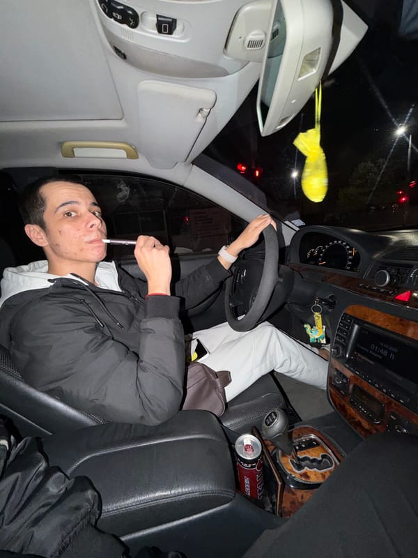 Young man vapes in car in Plovdiv, Bulgaria