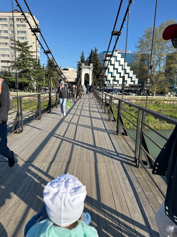 Family enjoys sunny afternoon outing in Sochi parks and playgrounds