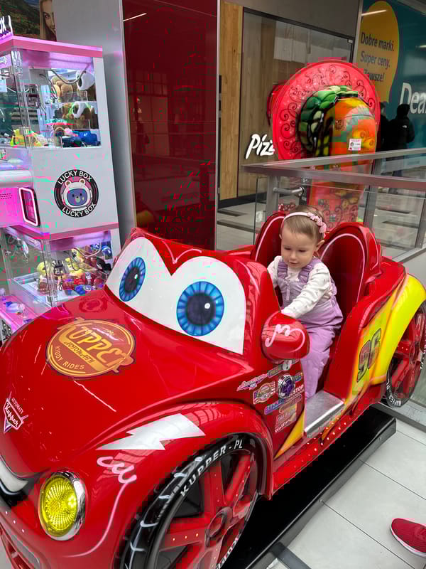 Child enjoys rides at Polish shopping mall