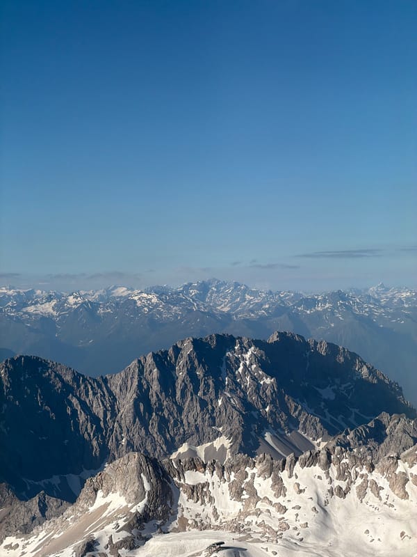 Zugspitze from above and the cable car, snow still on the peaks