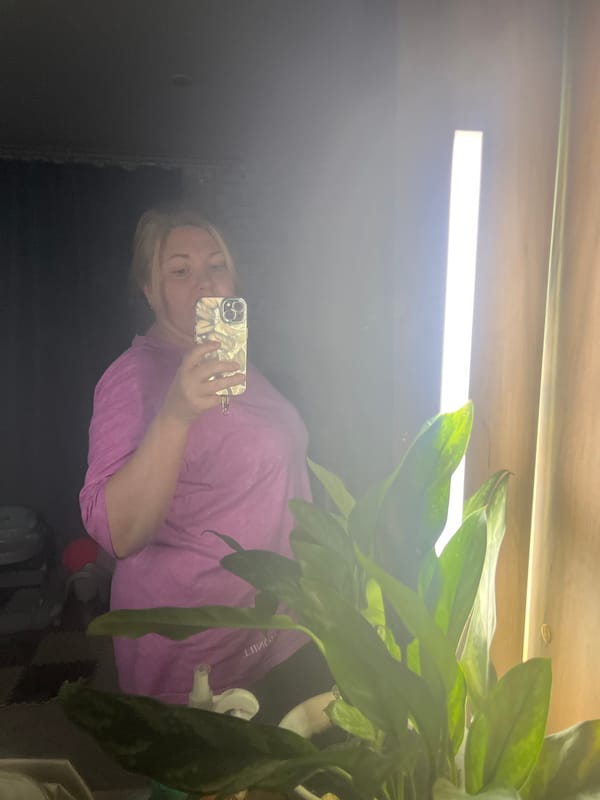 Women take mirror selfies in Vesyoloye, Russia
