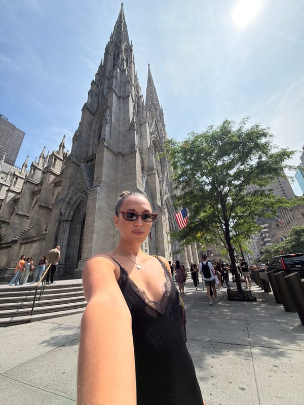 Tourist shops, takes selfie at St. Patrick's Cathedral