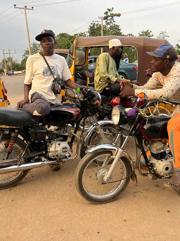 Daily street life documented across Abuja neighborhoods during evening hours