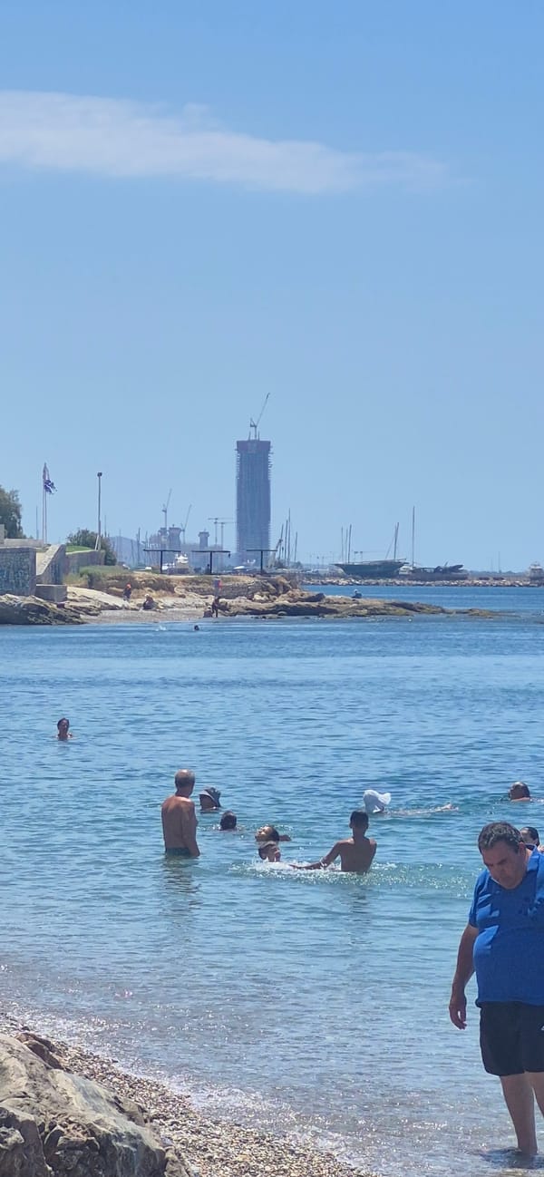 Calm summer morning at Paleo Faliro's pebble beach