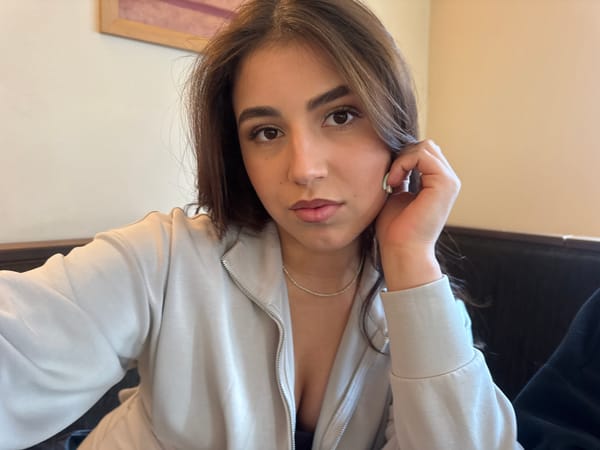 Woman takes bathroom selfies in Sofia restroom