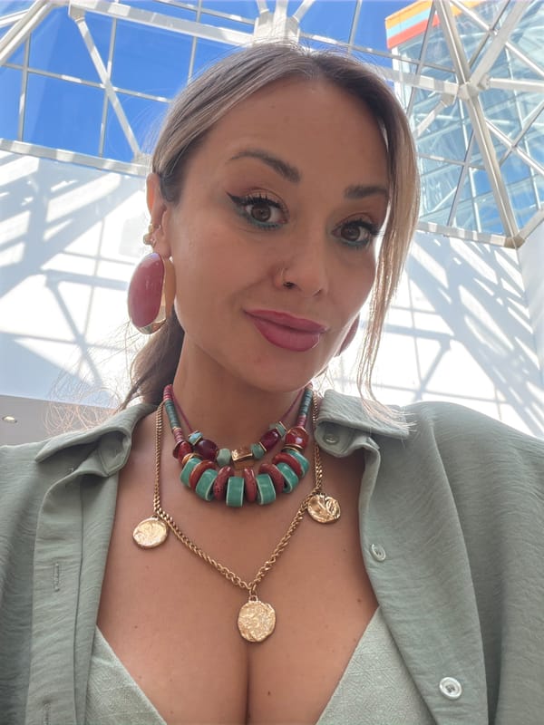Selfie series in Krasnoyarsk featuring green tops and bold jewelry