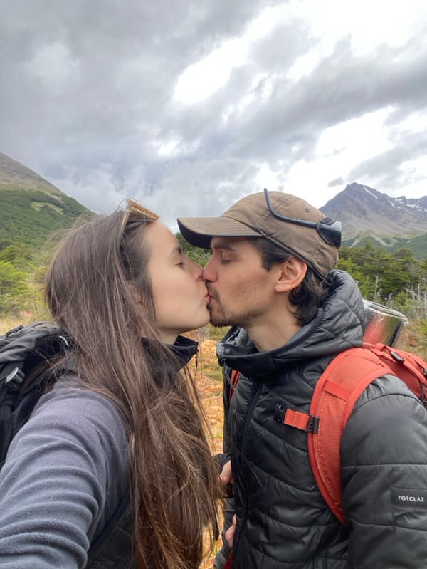 Couple shares romantic hiking moments in Ushuaia mountains