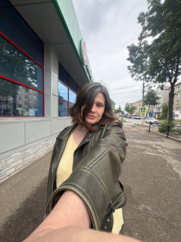 Morning selfies captured on overcast streets in Chaikovsky, Russia