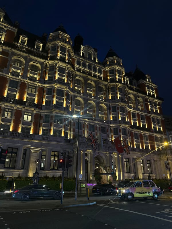 Upscale evening gathering with cigars, dining in central London