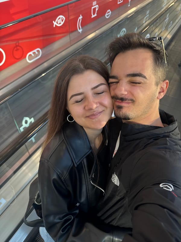 Couple shares tender moment on Sofia escalator