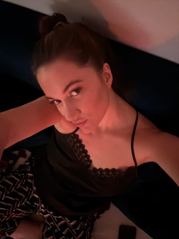 Woman photographed indoors in Belgrade residential setting