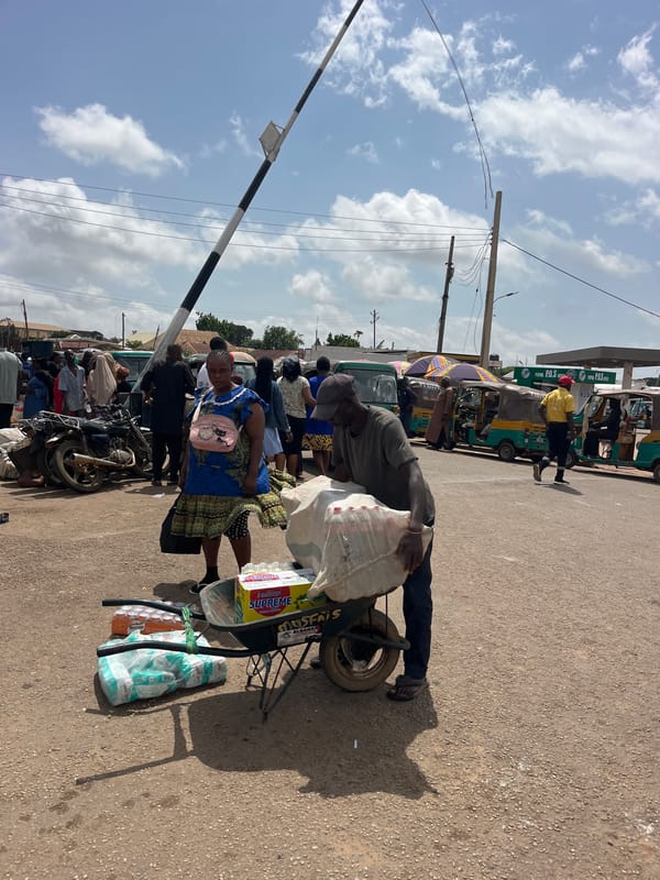 Street life and roadside commerce in a busy urban area