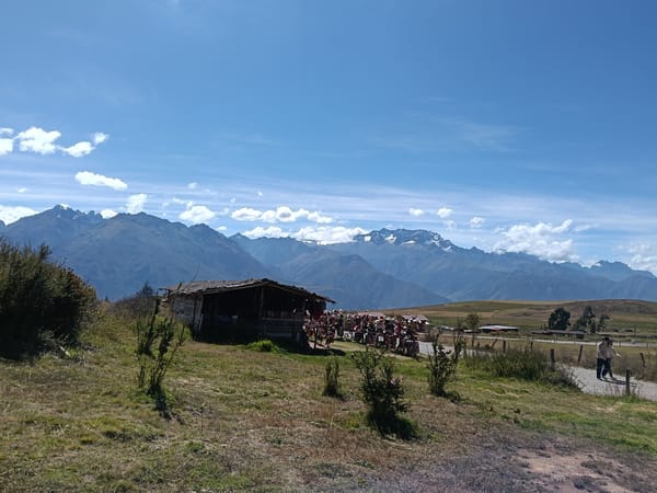 Tourist group visits ancient Moray terraces in Peru