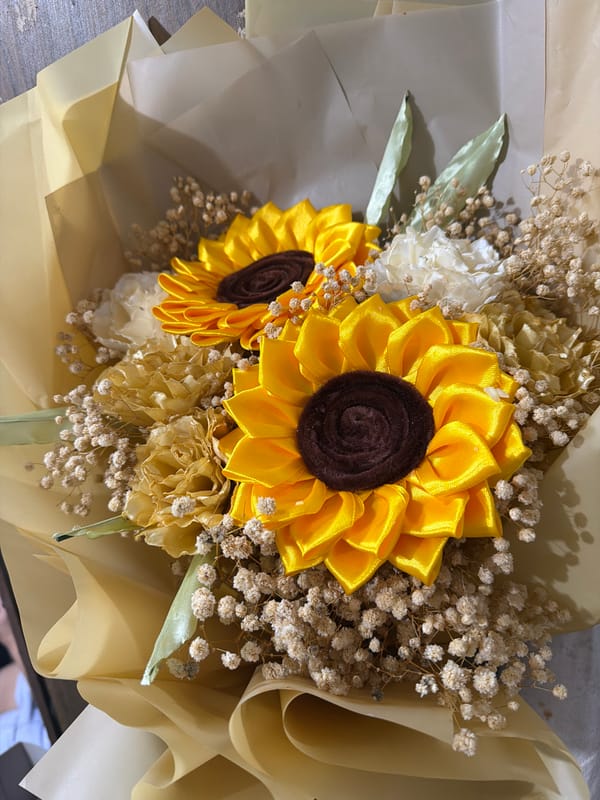 Birthday party spread with food, flowers, and cake in Davao City
