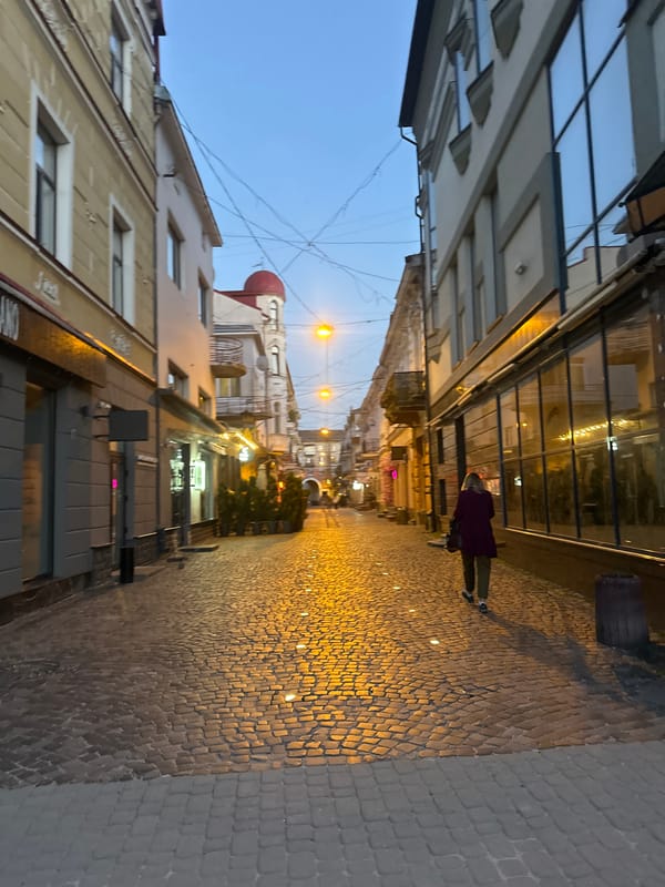 Ternopil city center at dusk, streets and squares winding down