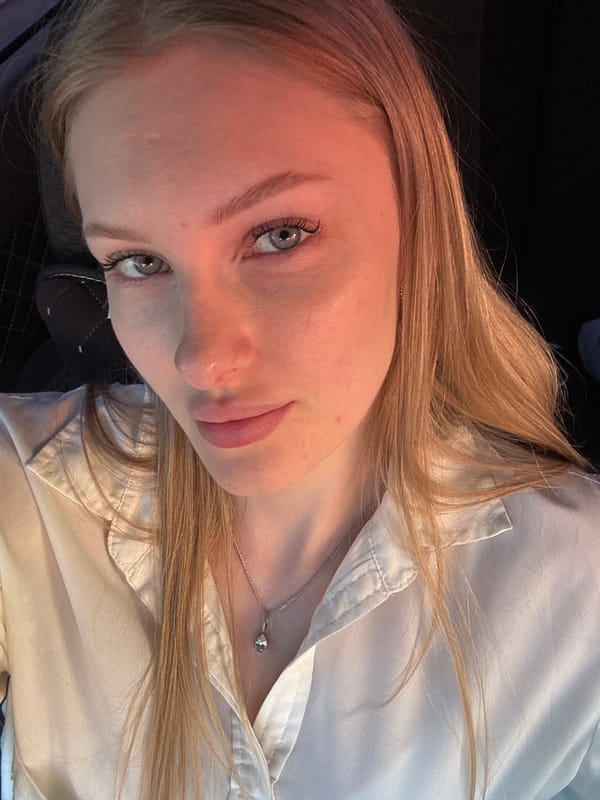 Woman takes selfies in car during Perm photo session
