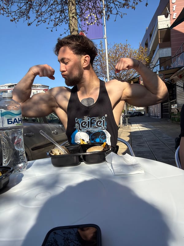 Men dining outdoors in Primorsko, Bulgaria