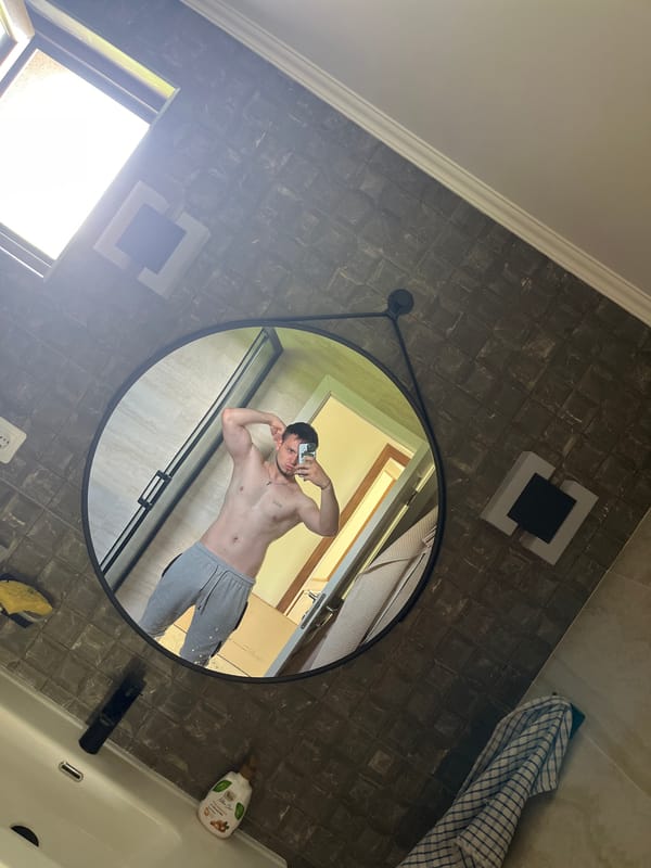 Man takes mirror selfies in bathroom in Войводино, Bulgaria