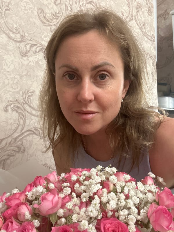 Kitchen activities with pink roses and food prep in Russia