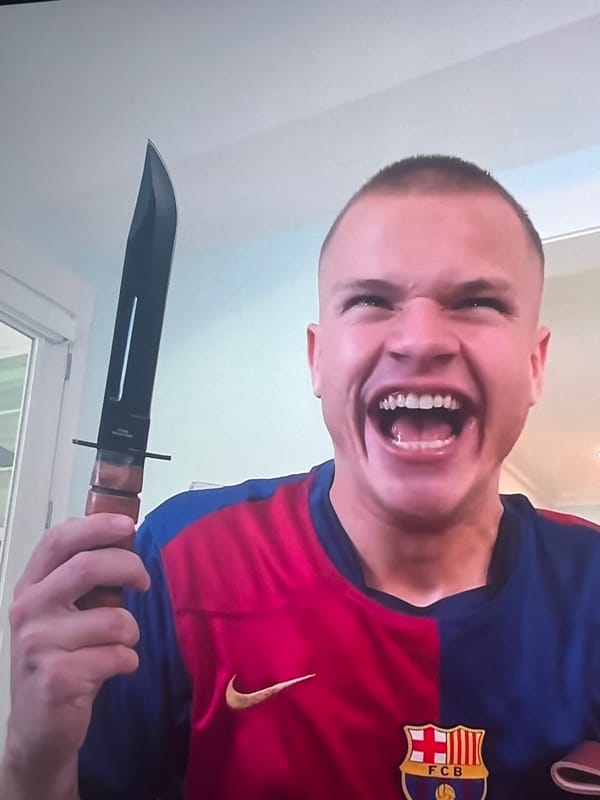 Barcelona fan makes exaggerated expression in Bragança, Portugal