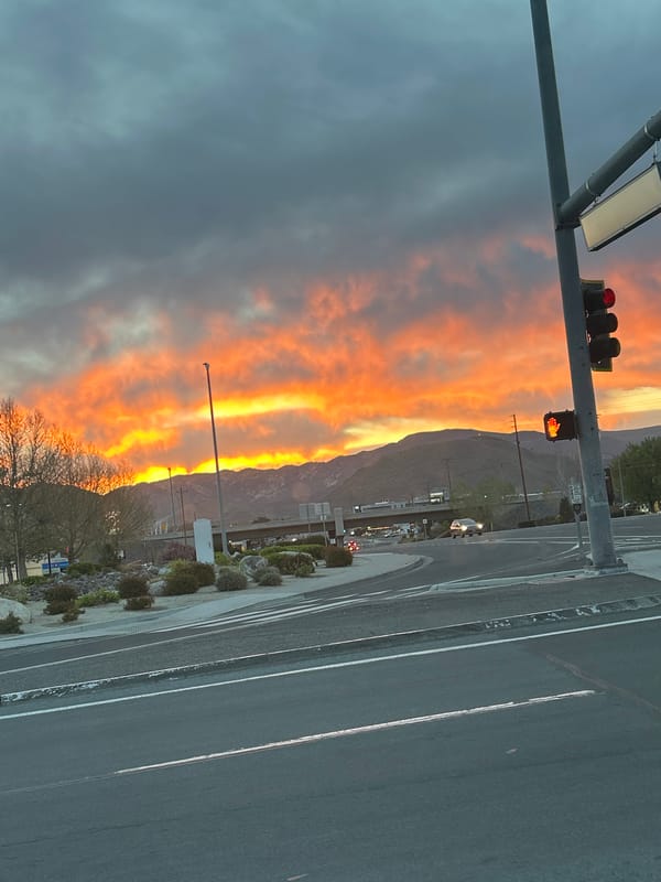 Sunset colors paint Reno skyline in orange and red