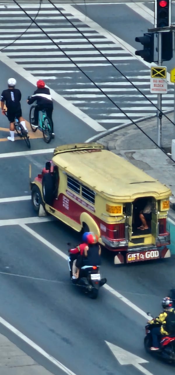 Makati streets from above: jeepneys, traffic, and city density