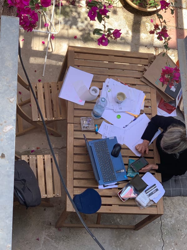 Person works outdoors at table in Tel Aviv