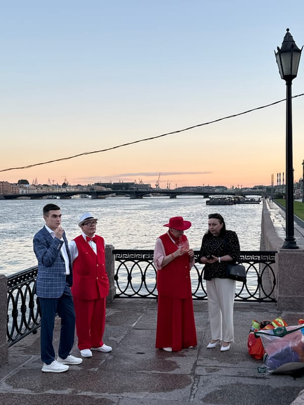 Evening gathering along Neva River embankment in Saint Petersburg