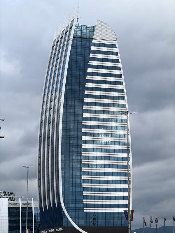 Modern curved glass building documented in Sofia, Bulgaria