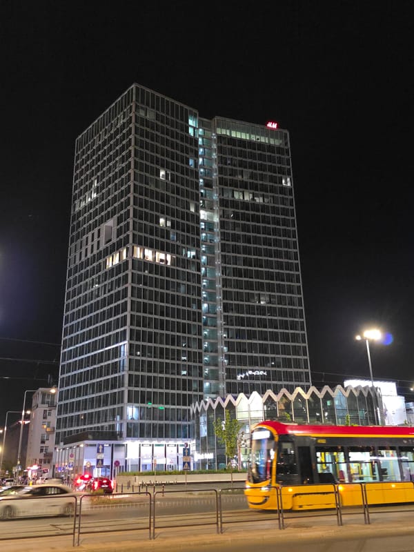 Warsaw nighttime skyline documented across downtown district