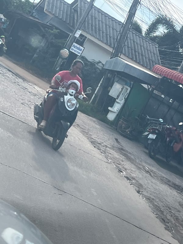 Ordinary morning street life captured in Thai village