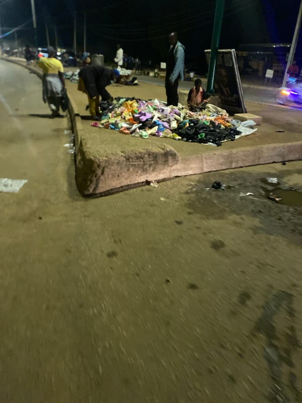 Evening market life continues in Bukuru, Nigeria streets