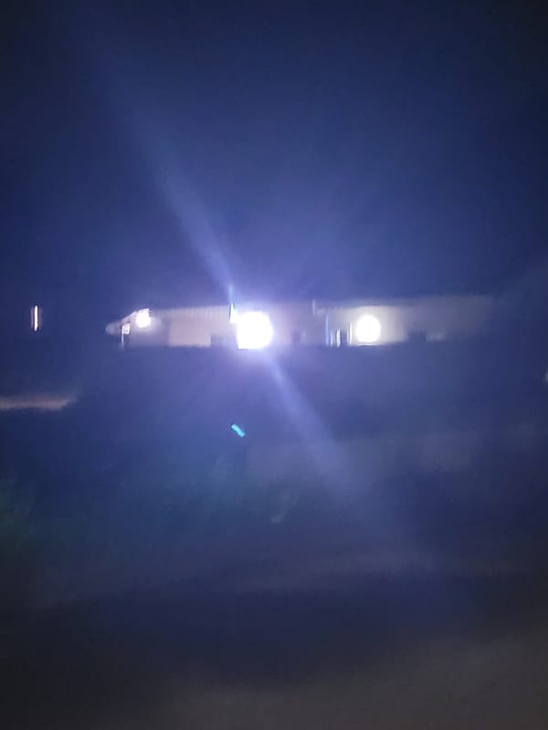 Evening scenes around illuminated buildings in Madalla, Nigeria
