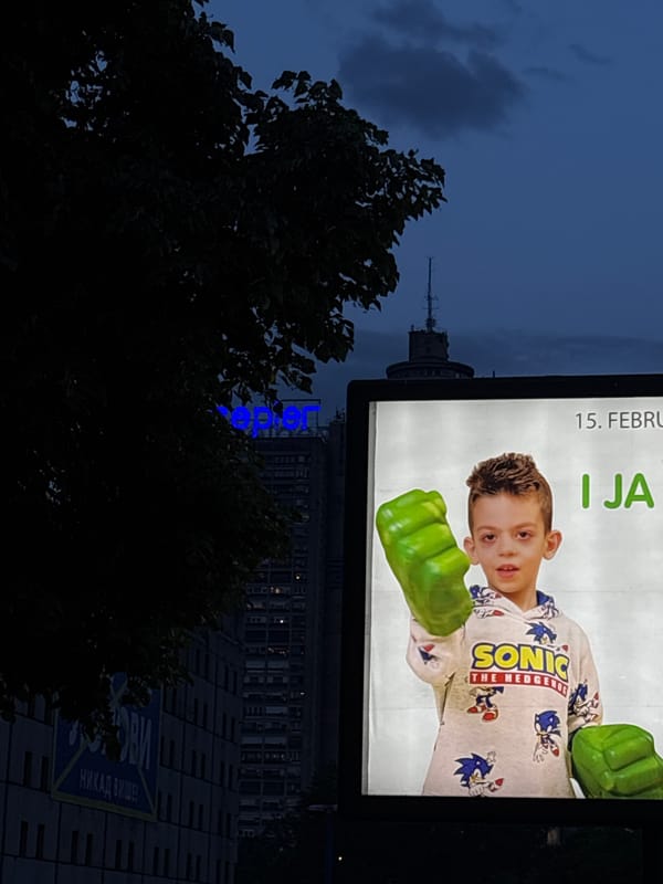 Billboard Shows Boy in Sonic Shirt, Hulk Hands in Belgrade