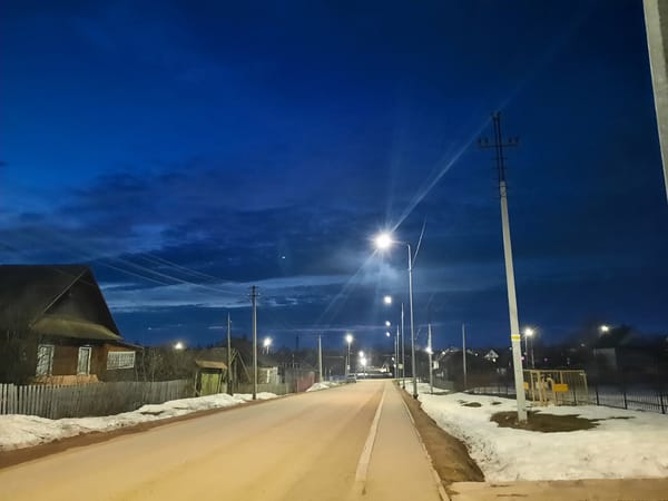 Evening street scene in snowy Krasnogorskoye, Russia
