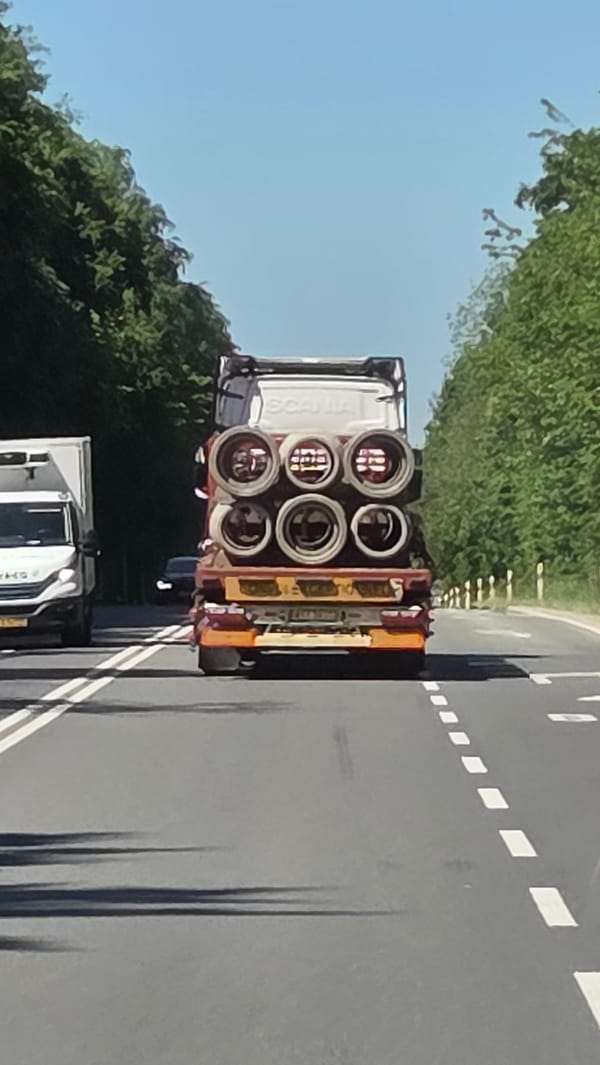 Oversized truck convoy transports concrete pipes through Luxembourg