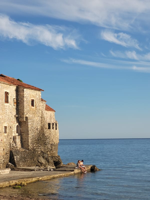 Clear skies and historic architecture captured in Budva