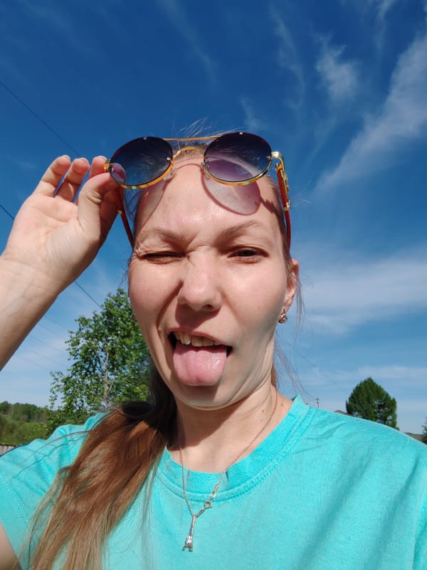 Woman takes playful selfie in Чухлэм, Russia