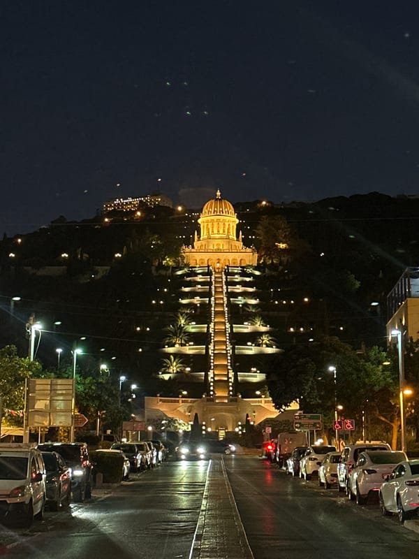 Haifa at night: the Bahá'í Shrine and city lights