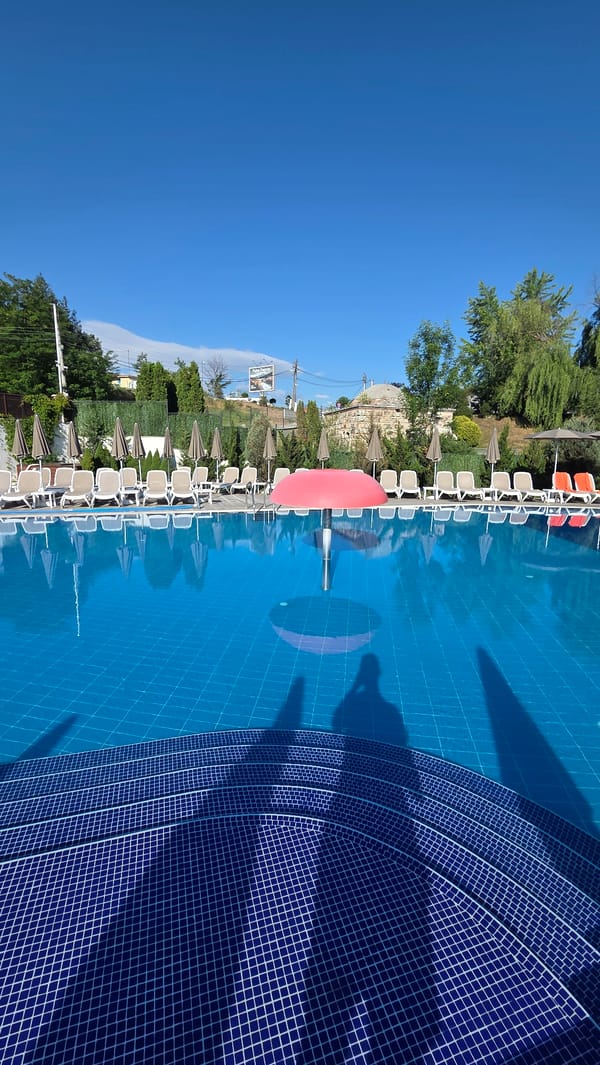Aqua Theme Park pool area on a sunny morning in Bania