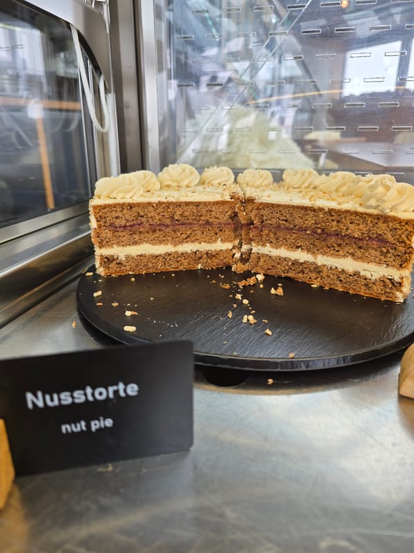 Cake slice photographed in bakery display case, Garmisch-Partenkirchen